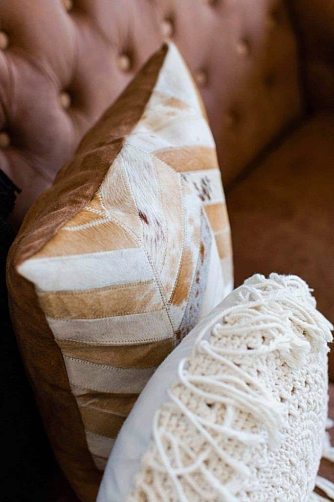 Interior Consultancy - brown lounge with white and brown pillows